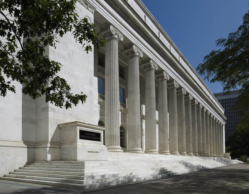 The white marble colonnade and steps of the Byron White United States Courthouse in Denver.